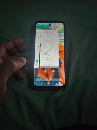 Tela original com aro moto g35. Vidro quebrado