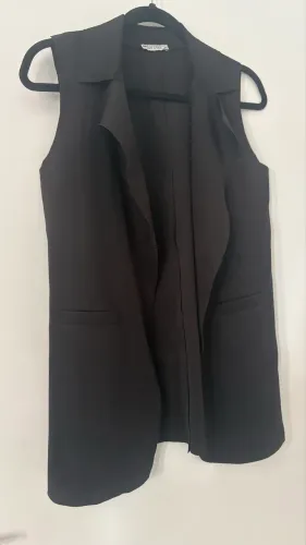 Colete preto, M