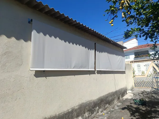 Toldo de mola com tela solar