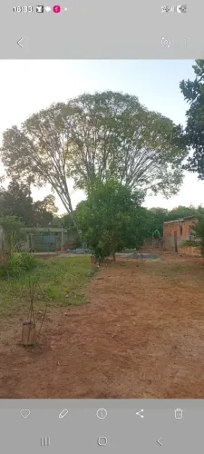 Terreno com casa em fase de obras,rua asfaltada,água, luz, tudo perto,colegio,mercado.