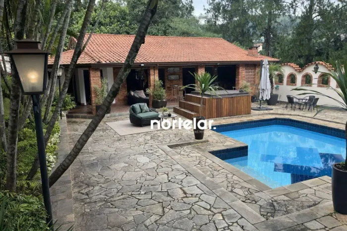 Casa com 4 dormitórios à venda, 615 m² por R$ 3.200.000,00 - Condomínio Refúgio dos Pinhei