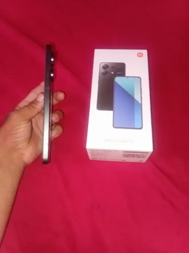 Eu tenho um celular redmir note 13 xaomi para vender quem quiser pv de 256 g de memoria