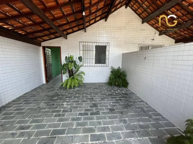 Casa com 3 dormitórios à venda, 104 m² por R$ 500.000,00 - Vila Guilhermina - Praia Grande
