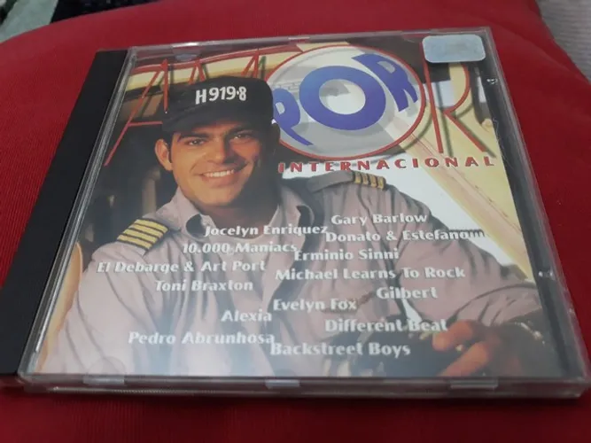 CD Por amor internacional