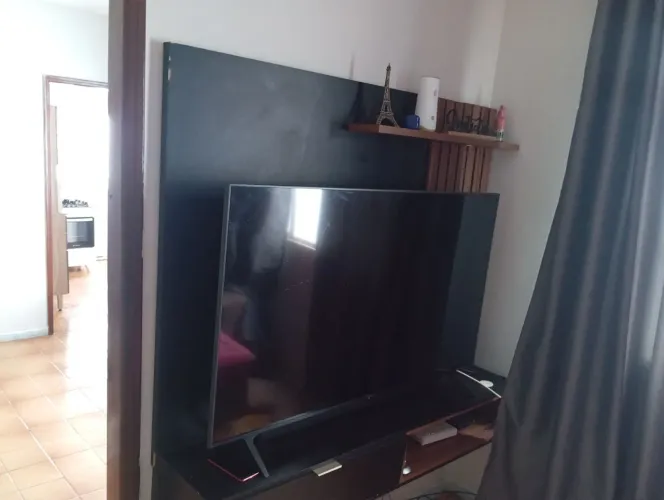 Tv 60 polegadas LG com painel de parede