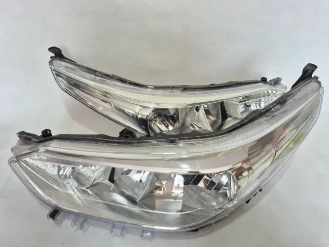 Par de farol yaris original 