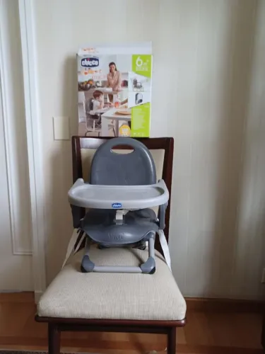 Cadeira para alimentação Chicco até 15kg cinza<br>R$ 210.00