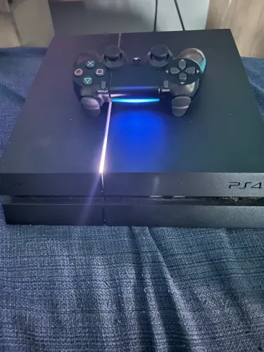 PS4 com 2 controles e jogos