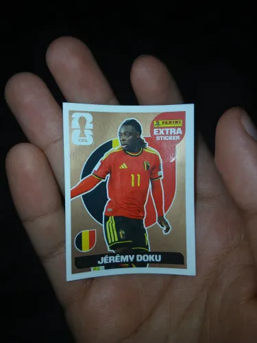 Figurinha da copa de 2026 do Jérémy Doku de bronze em perfeito estado de conservação.