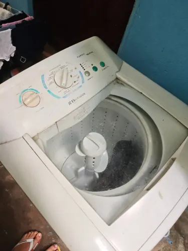 Máquina de lavar com defeito