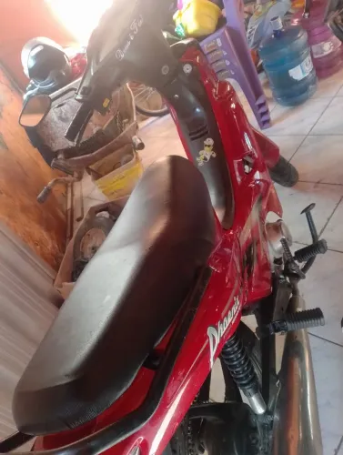 Vendo uma Shineray ano 2012 no valor de 4.000 fala com Lidia */ * 