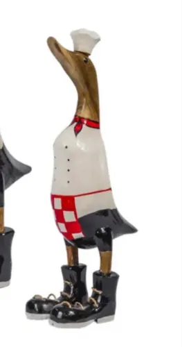 Pato de botas cozinheiro