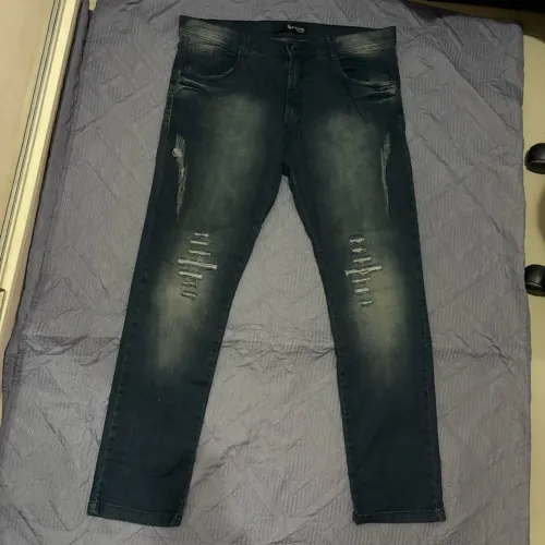 Calça jeans tam 48