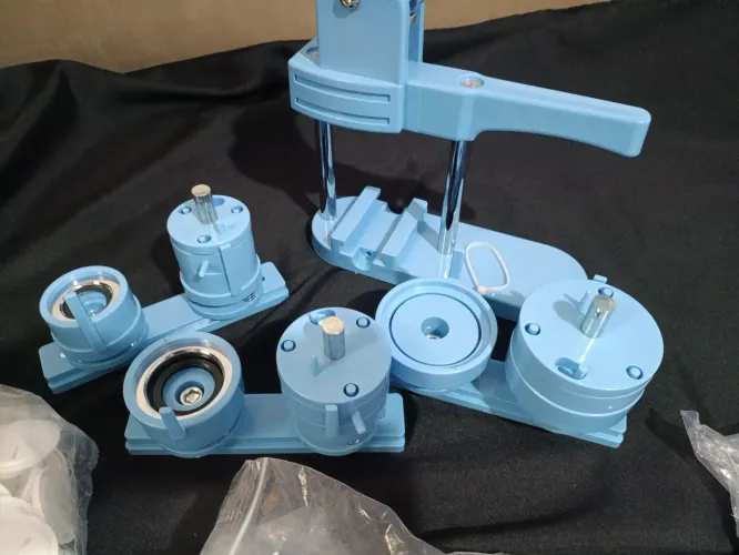 Máquina de bottons