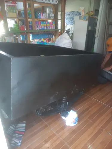 Carroça para reboco de carro.