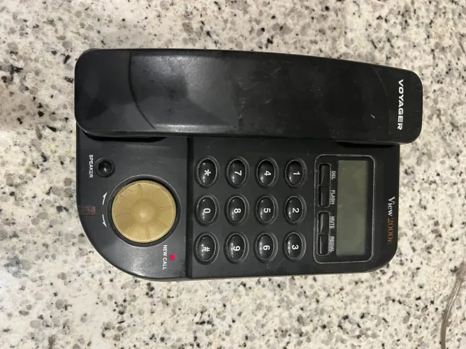Telefone fixo Voyage 2000E a pilha e a energia.