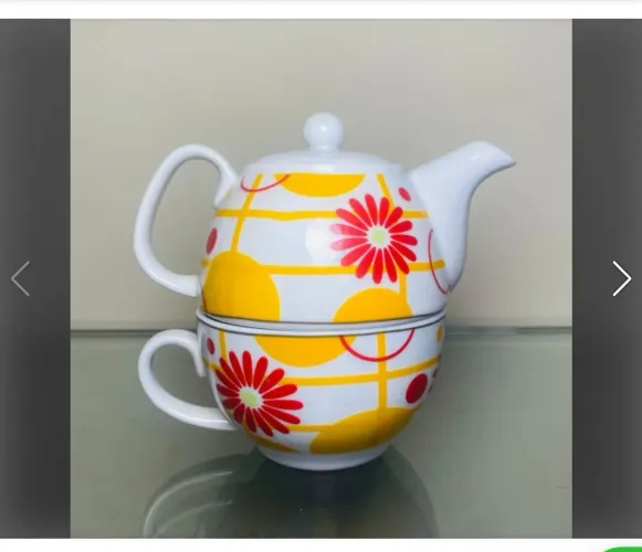 Bule e xícara de chá em porcelana