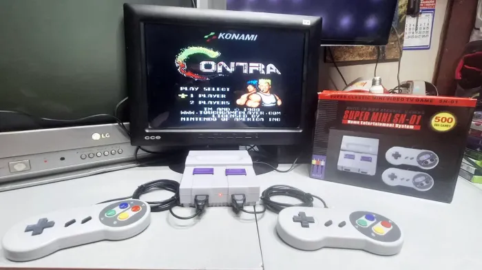 Video game novo na caixa 2 controles e com vários jogos do Nintendo 8 Bit 