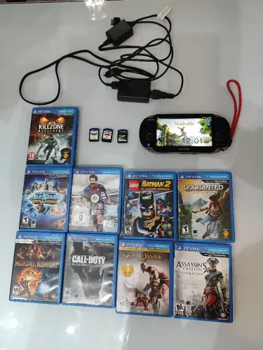 Ps vita OLED (FAT)com 12 jogos mídia física em excelente estado!