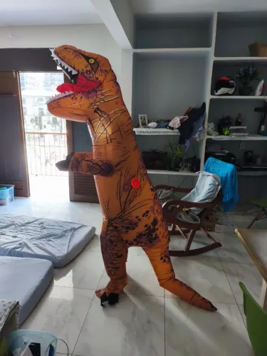 ? Fantasia Inflável Dinossauro T-Rex - Sucesso Garantido em Festas!