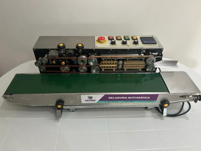 Máquina seladora automática com datador de tinta