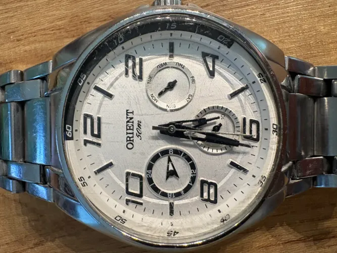 Relogio orient quartz