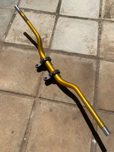 Guidao oxxy dourado