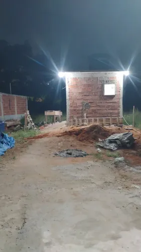 Vendo terreno com quitinete em Xerém.