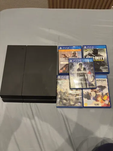 PlayStation 4 Fat - Acompanha 05 jogos + 01 controle replica