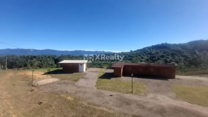 Paraíso Particular e Alta Rentabilidade: Sítio Premium com Duas Casas, Cachoeira e Vista d