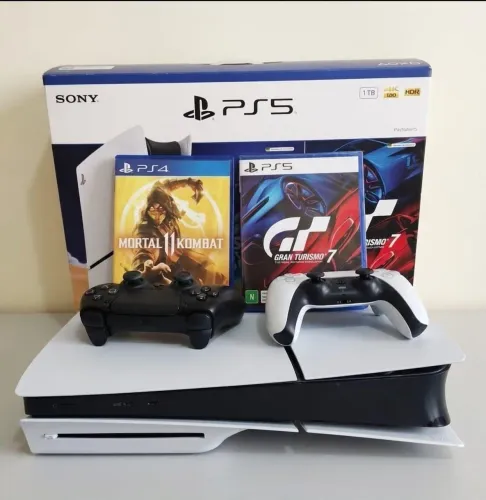 vendo ps5 slin com leitor dois controles e doia jogos e caixa