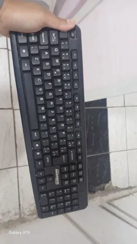 teclado de computador preto da marca Maxprint