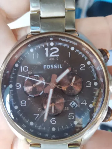 Relógio fóssil 3janelas valor 500 reais