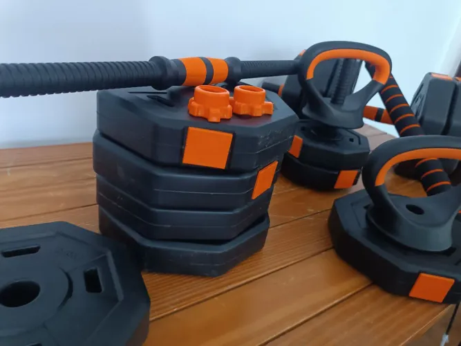 Kit de alteres, barra e anilhas. Peso de 40kg.