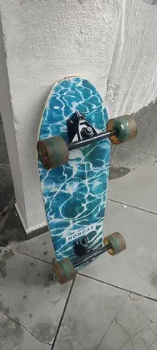 Skate semi-novo shape com pintura em lixa 