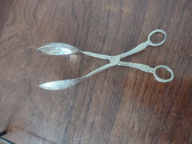 Pegador de salada antigo em metal prateado