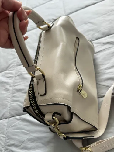 Bolsa pavão de ouro