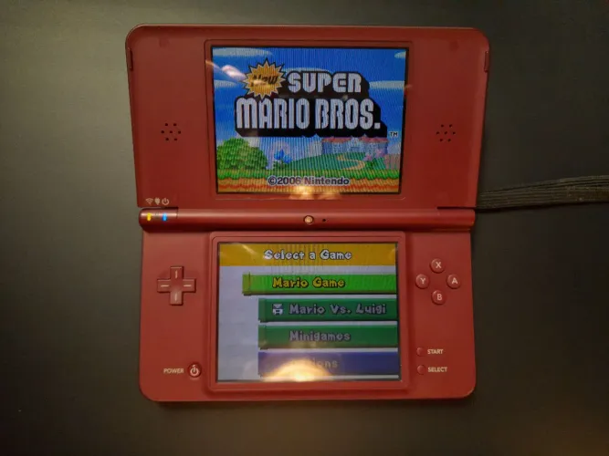 Nintendo dsi xl com R4 com vários jogos e caixa completa!