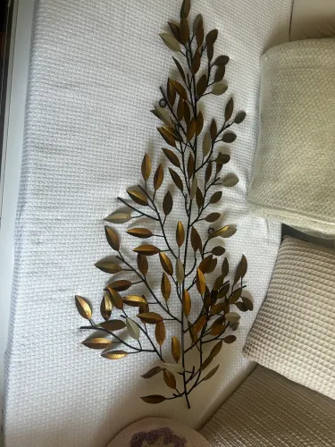 Escultura de parede em ferro