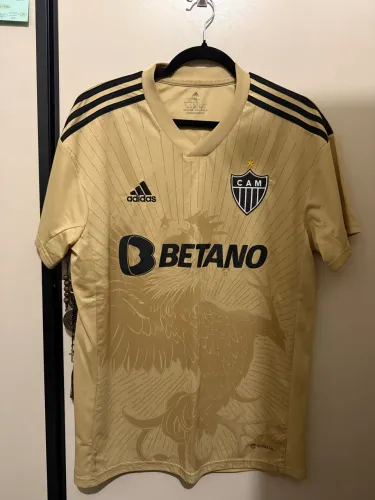 Camisa Atlético MG dourada