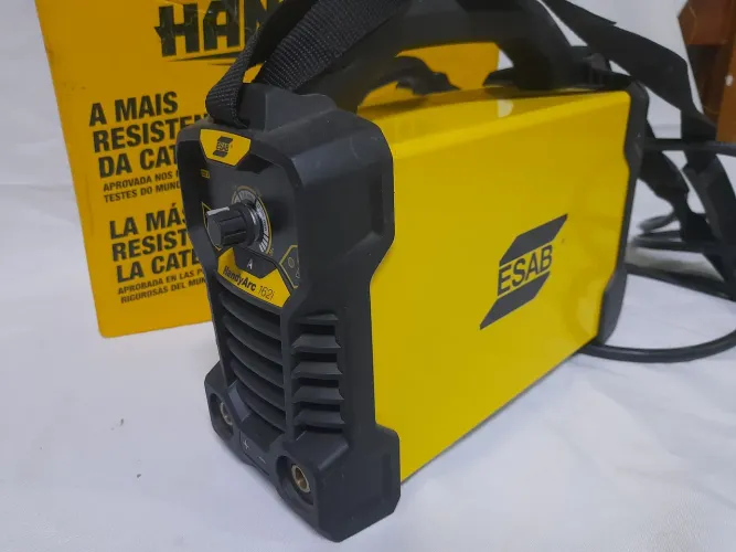 Vendo máquina de solda esab handyarc 162i 220v