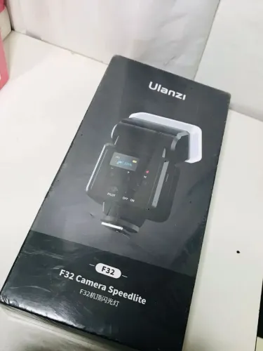 F32 câmera speedlite