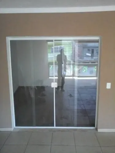 Porta de vidro para área externa
