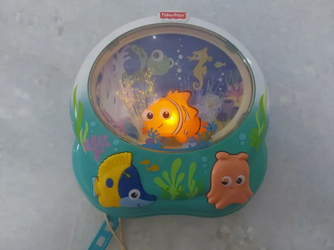 Brinquedo Musical Fisher-Price - Aquário com Luzes procurando nemo