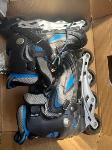 Patins com equipamento de segurança ( 33 -36)