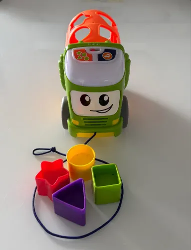 Caminhão Fisher Price com blocos de encaixe, Luz e Som