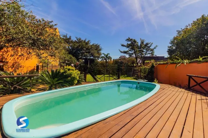 Casa de 3 dormitórios, no Bairro Ponta Grossa - Porto Alegre