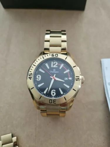 Relógio Champion Dourado - perfeito estado