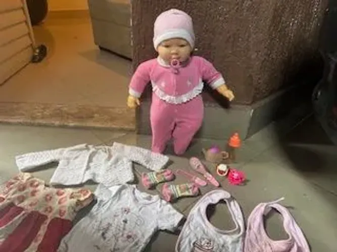 Boneca com acessórios 
