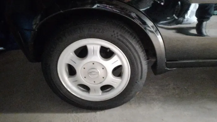 Rodas de liga leve 14 com pneus bom  pra venda 